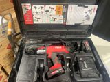 a box with tools in it sitting on a table