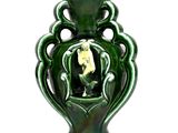 un vase vert contenant un oiseau, sur fond blanc