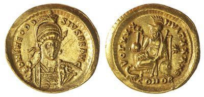 une pièce d'or portant l'image d'un homme et d'une femme