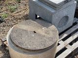 a pile of concrete blocks sitting on top of a pallet