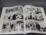 a black and white picture of a comic book open