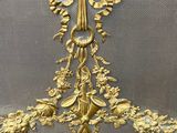 antique french gilpwork with flowers and birds on a silver background