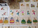 a lot of cards that are on the table