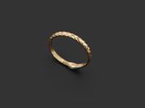 a gold ring on a black background