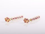 a pair of pink sapphire and diamond earrings