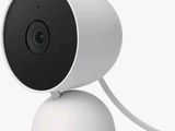 a close up of a camera with a cord attached to it