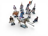 a lot of figurines that are on a white surface