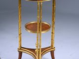 an image of a small table with a clock on top of it