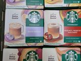 several boxes of starbucks coffee are stacked on top of each other