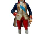 a figurine of a man dressed in a military uniform