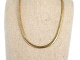 a gold chain necklace on a mannequin mannequin mannequin mannequin mannequin mannequin mannequin mannequin manne