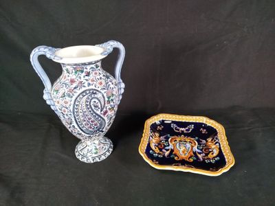 two vases that are next to each other on a table