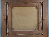 an old picture frame with a rope hanging from it ' s side