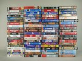 a lot of dvds stacked on top of each other