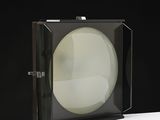 a black and white picture of a light in a box