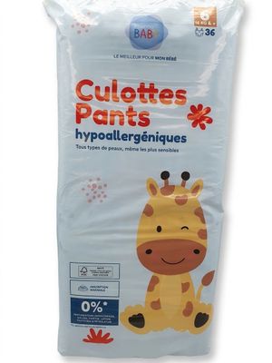 a close up of a bag of diapers with a giraffe on it