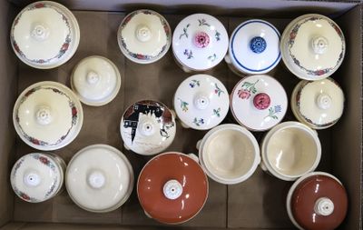 many bowls and cups in a box on the table