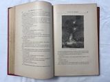 an open book with a picture of a cat on it