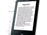 an image of a kindle with water splashing on the screen