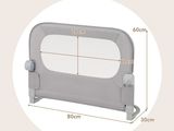 the baby gate is made of plastic and has a metal frame