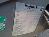 a close up of a sign on a parking meter