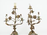 pair of antique brass candelabs with flowers and leaves
