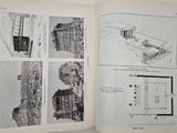 an open book with drawings of a house in it