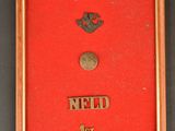 an old picture of a red box with a coin in it