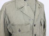 an image of a jacket with buttons on it