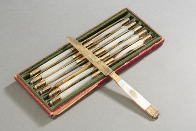 a box with a bunch of candles inside of it