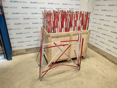 a wooden crate with a bunch of red arrows on it