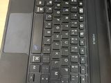 a close up of a laptop keyboard on a table