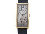 une image d'une montre avec des chiffres romains sur le cadran