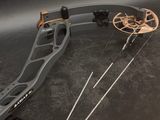 an image of a bow and arrow laying on a table