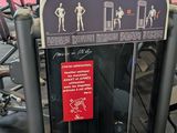 a machine that is sitting in the middle of a gym