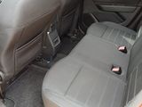 the back seats of a car are empty in the back of the car
