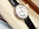 a watch that is sitting in a box on a table