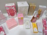 a lot of different types of perfumes on the table