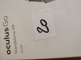 a box with a pair of scissors on top of it