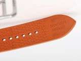 brown leather watch strap with white stitching on a white surface