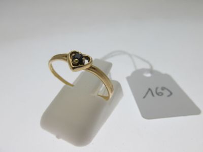 bague monture or 750°/°° ornée d'un coeur serti d'un petit… - Photo 1