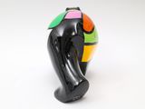 a black vase with a multicolored design on it