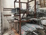 a large rack with a bunch of metal items on it
