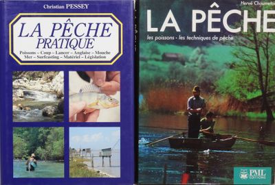two books on a table with a man in a boat and a man in a boat
