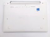 a laptop that is sitting on a white surface