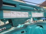 an image of a blue machine with a sign on it