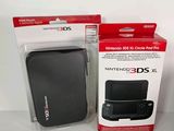 packaging of nintendo 3ds xl and a nintendo 3ds xl