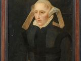 portrait d'une femme vêtue d'une robe noire et portant un voile sur la tête