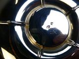 a close up view of a metal object with a hole in it