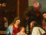 painting of a group of people gathered around a baby in a manger